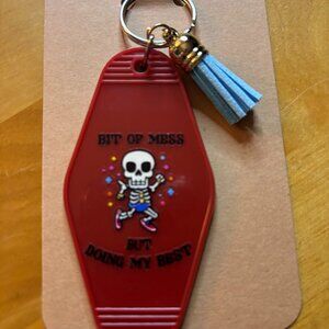 Bit of mess buy doing my best blue tassle key chain handcrafted by me